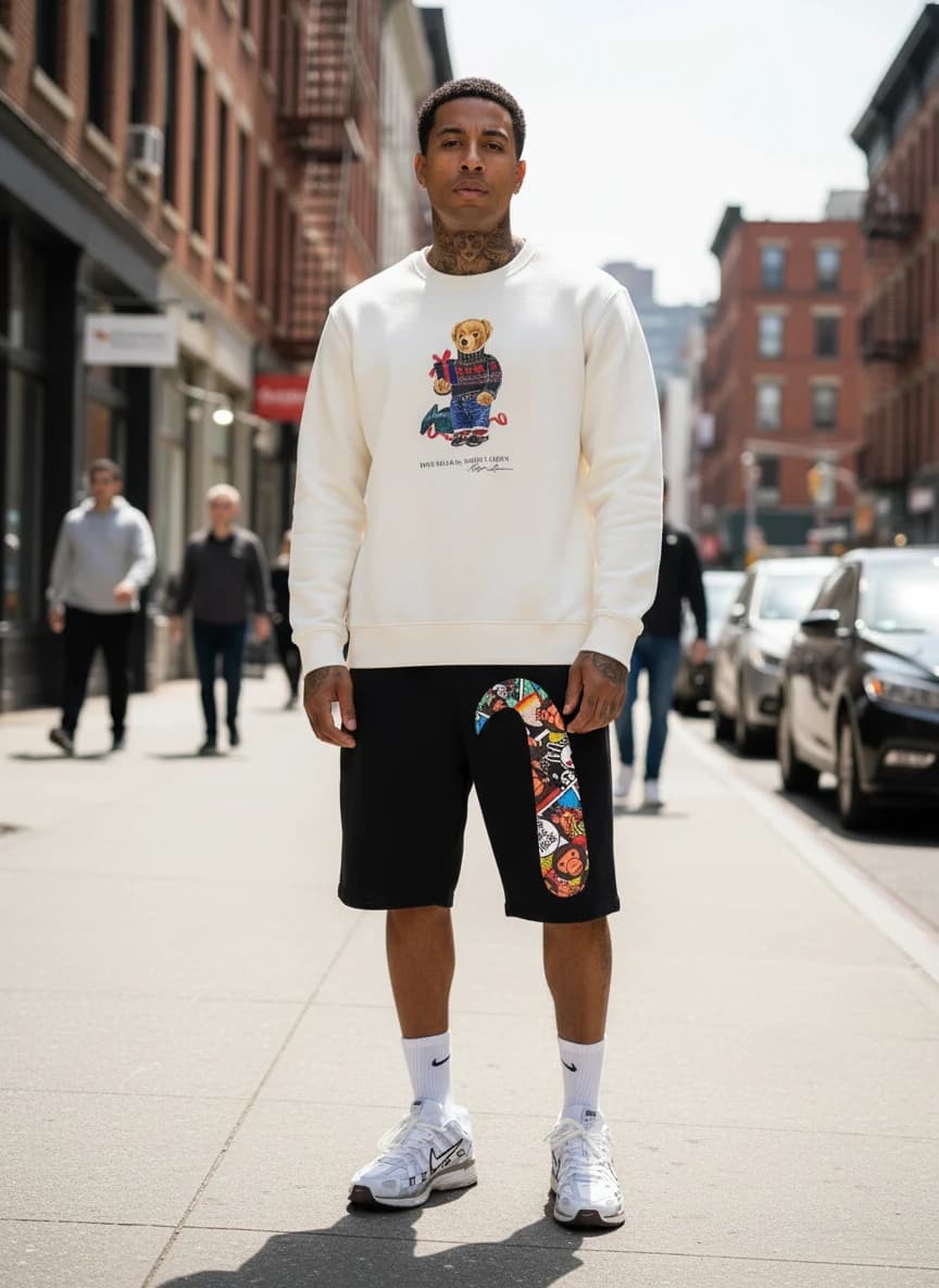 Ralph Lauren Polo Bear Cream Sweater, A BATHING APE Black Shorts with Colorful Monkey Print, Nike P-5000 Sneakers in White and Brown