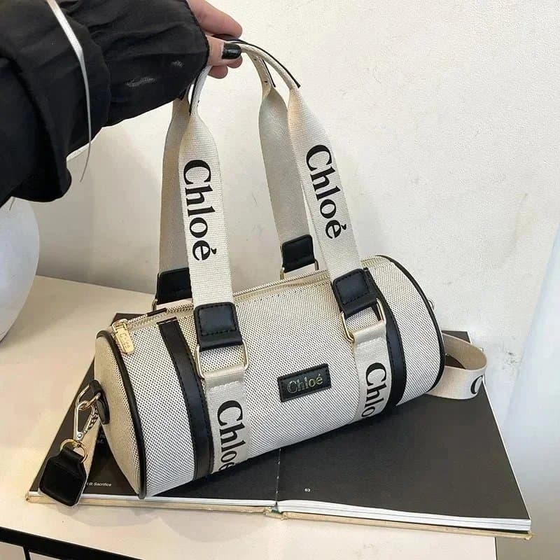Chloé Canvas Barrel Bag in White with Black Accents