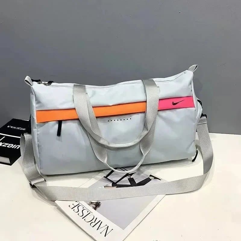 Nike Dri-FIT Travel Bag in Light Grey with Orange and Pink Accents