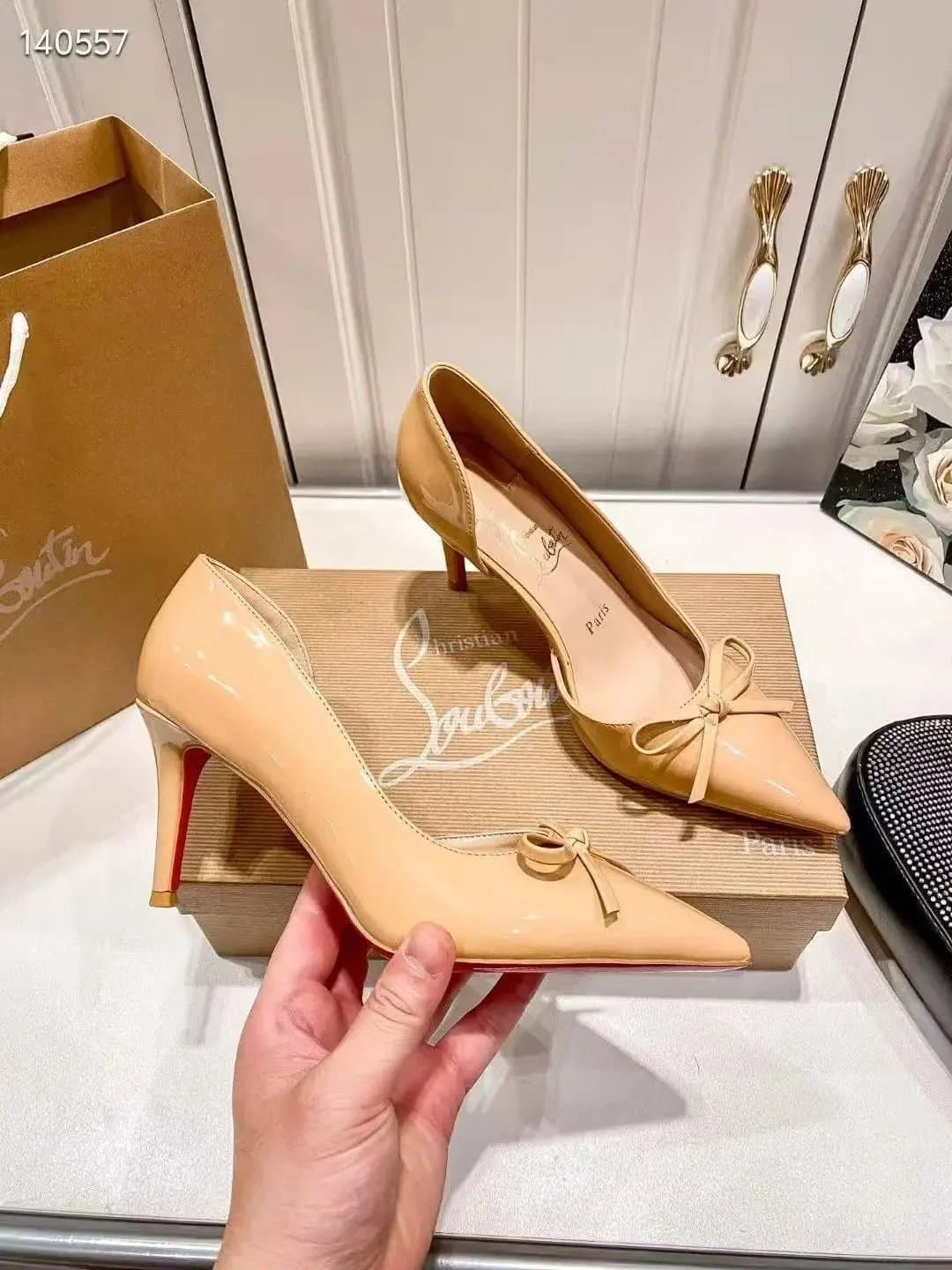 Christian Louboutin Nude Patent Leather Heels with Bow Detail