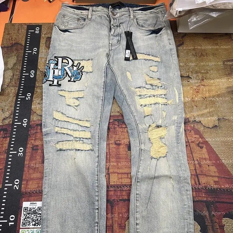 Raf Simons Distressed Slim Fit Jeans with Embroidered Patch Blue - 1