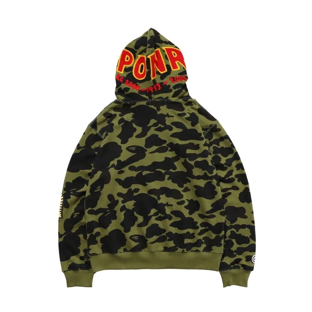 A Bathing Ape A Bathing Ape Camo Hoodie with Embroidered 'PONP' Logo Green - 1